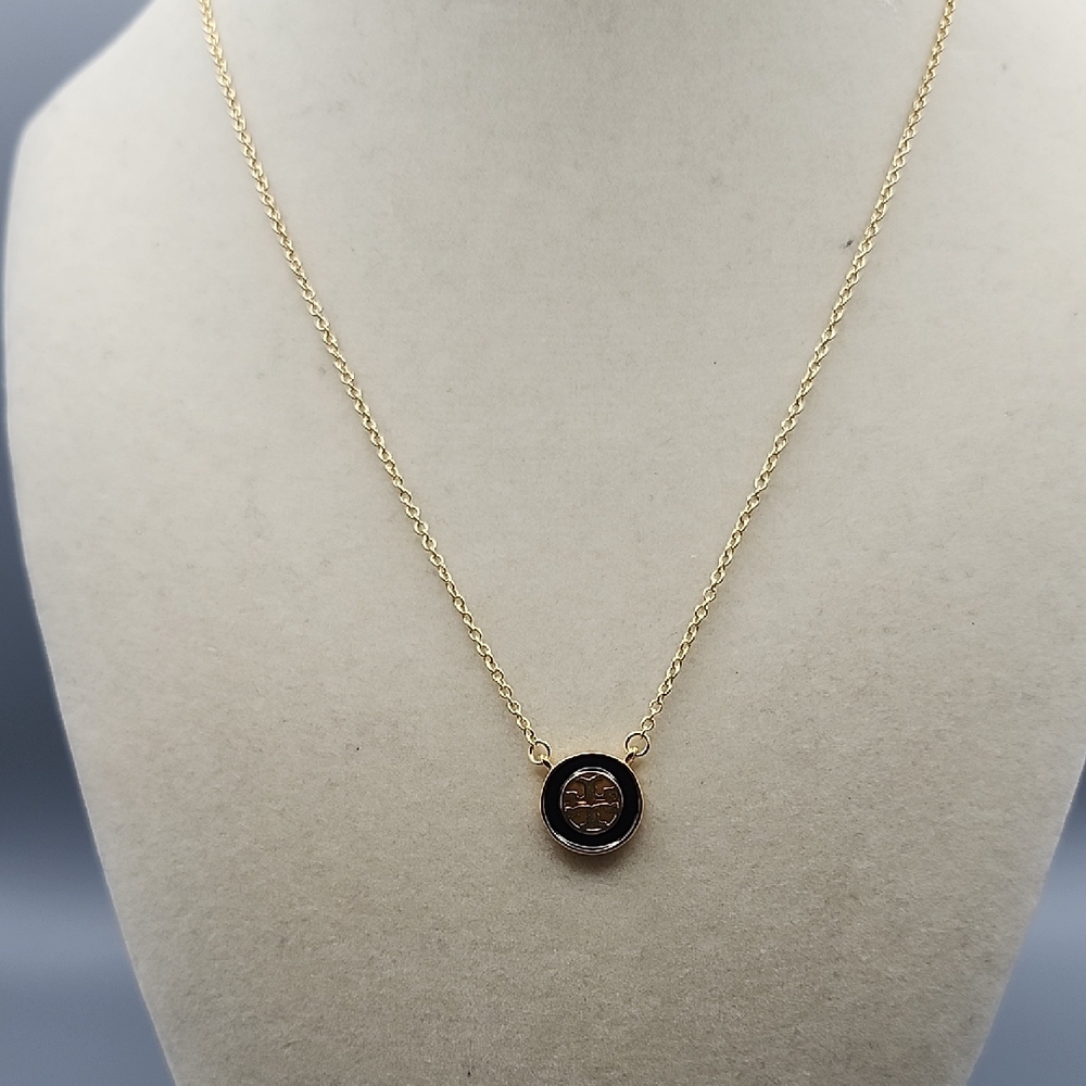Tory Burch Black and Gold Emblem Necklace - Picture 2 of 9